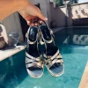 GOLD/BLACK STRAP HEELS